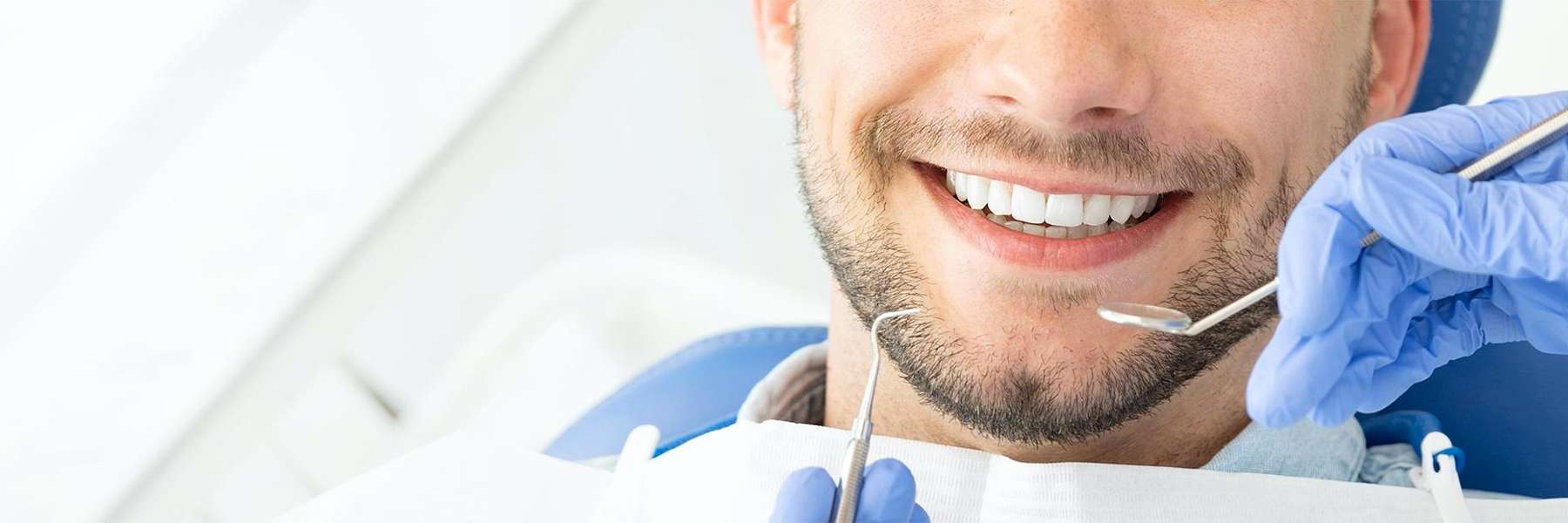 man getting dental crowns in midtown manhattan 