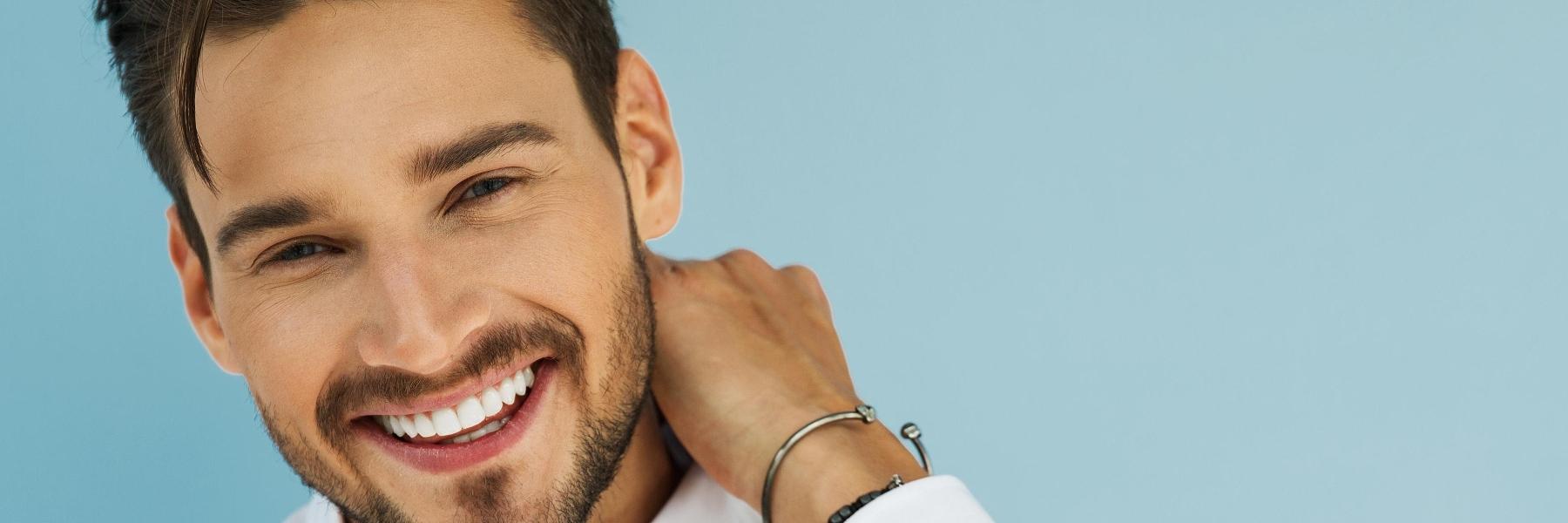 man with his teeth professionally whitened in NYC