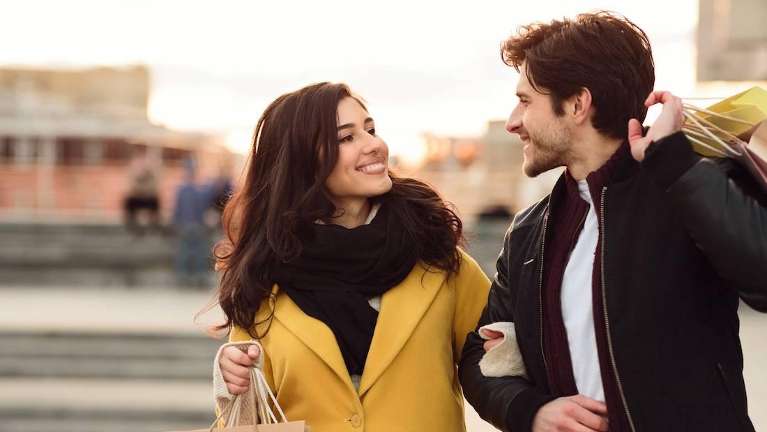 couple smiling in New York, NY