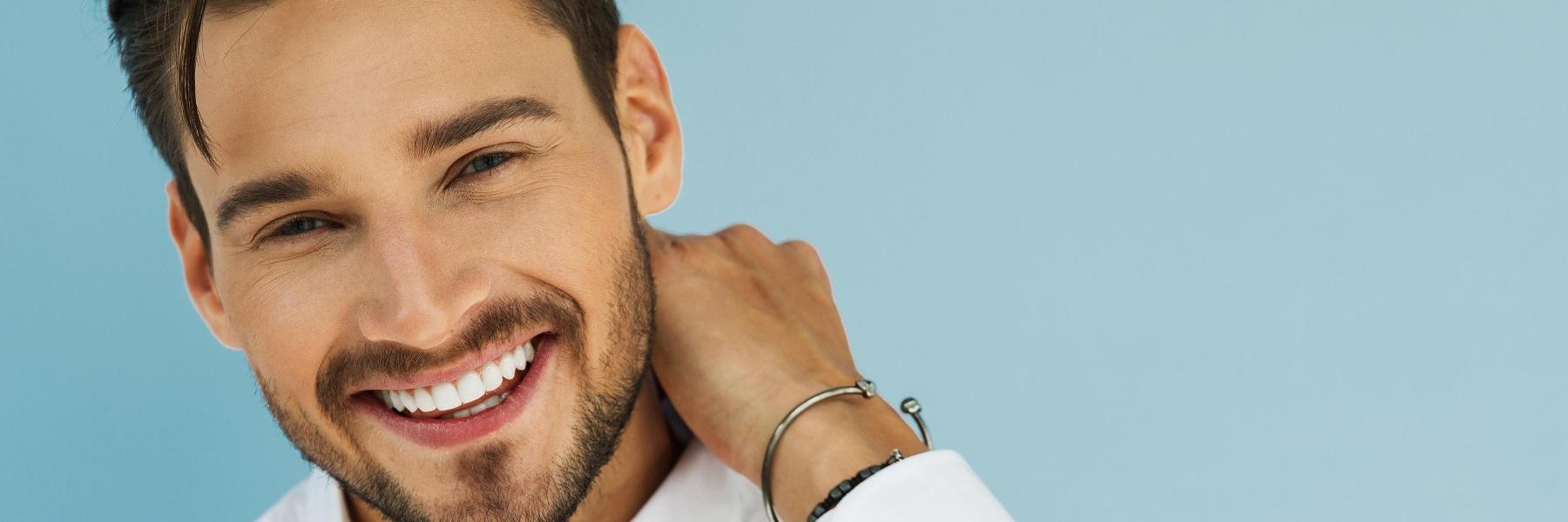 man after teeth whitening in midtown