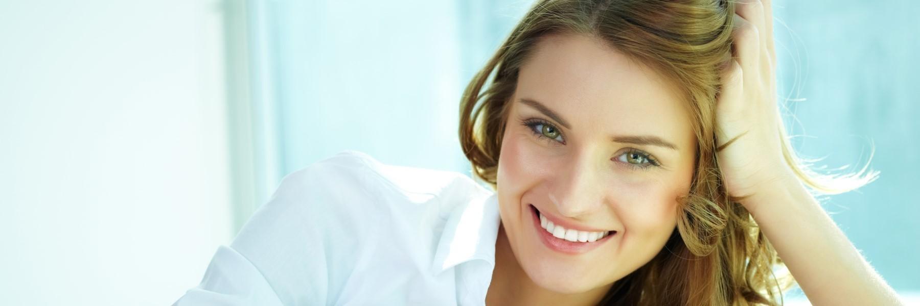 girl with Invisalign clear aligners in midtown nyc