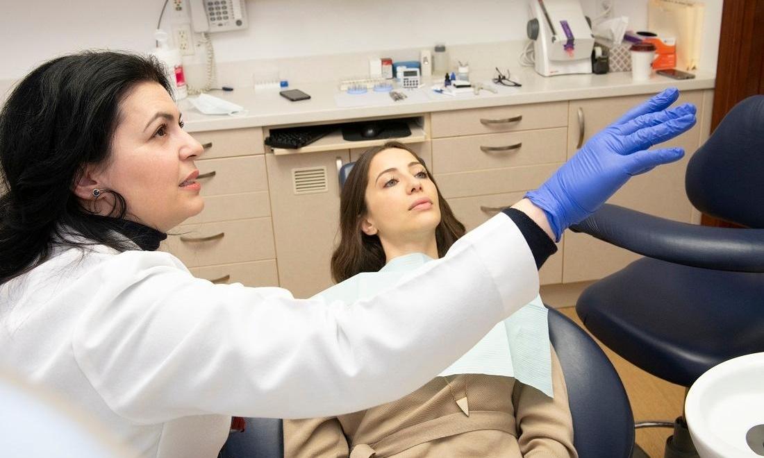 Dental hygienist and patient at dentist near me Midtown NYC