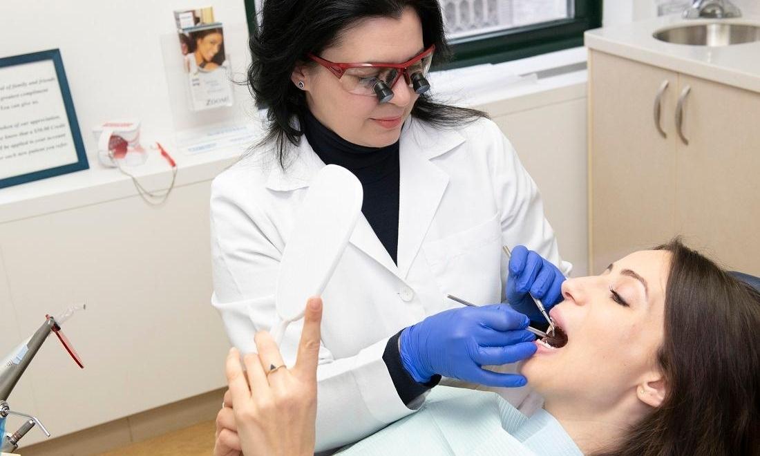 Patient getting dental exam in Midtown NYC